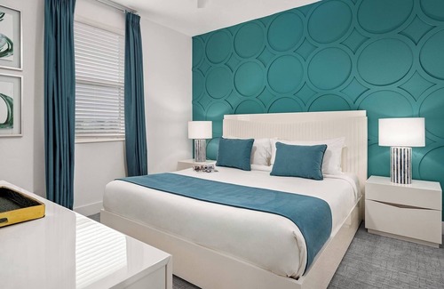 Florida Center Hotel | 9 Bedroom Home at Villatel Orlando Resort - Water Slides & Kids’ Playroom