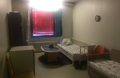 Lantinen District Apartment | A cozy room in kannelmaki