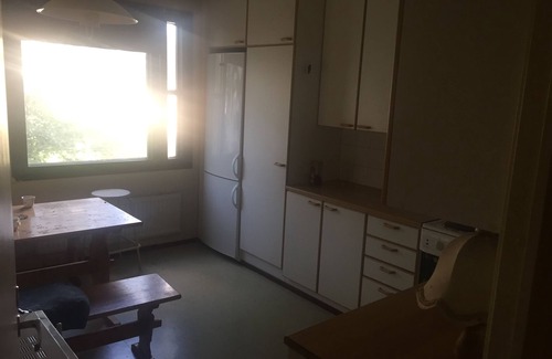 Lantinen District Apartment | A cozy room in kannelmaki