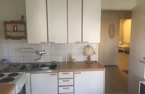 Lantinen District Apartment | A cozy room in kannelmaki