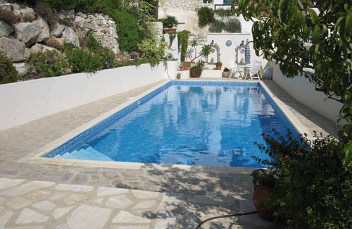 Tsada Villa | A hillside retreat with a large pool and set in extensive gardens