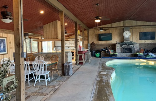 Morton House | A MANSION WITH A HUGE INDOOR HEATED SWIMMING POOL WITH A BONUS THEATER ROOM.