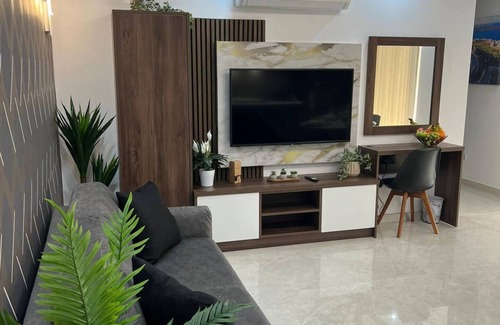 Bugibba Apartment | A modern apartment block in the heart of Bugibba. All one-bedroom flats, stylishly finished and fully equipped with comfort, ideally located close to shops, services, and all amenities.