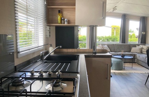 Sint Maarten House | A modern chalet on a spacious plot with a garden shed and electricity for your e-bikes.