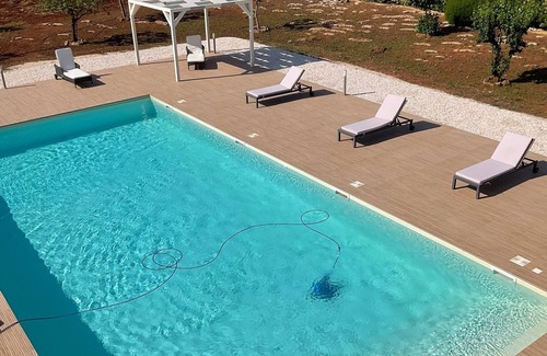 Sava Villa | A modern villa set between Sava and Campomarino in a peaceful private setting.