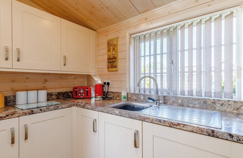 Hundall Cottage | A Nordic Style 6 berth Luxury Lodge with raised veranda on 3 sides.
