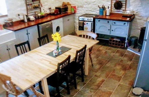 Whitland Cottage | A spacious yet cosy eco converted dairy barn, situated within a vineyard.