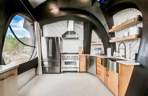 Ransom Canyon House | A stay like no other—inside an iconic steel sculpture with panoramic canyon and lake views.