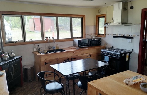 Coyhaique House | A Tranquil Escape in Patagonia: Experience the Charm of Lago Frío