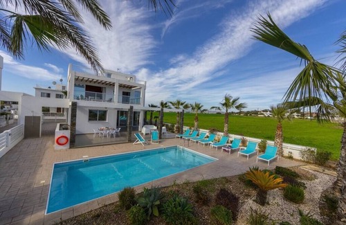 Pervolia Villa | A Truly Spectacular First-Line Sea Front Villa in the beautiful village of Pervolia