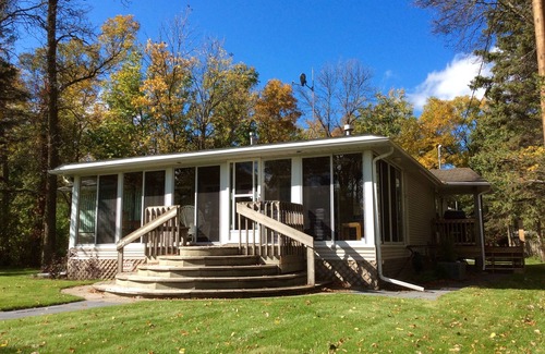 Gimli Cottage | Across the street from a sandy swimming beach