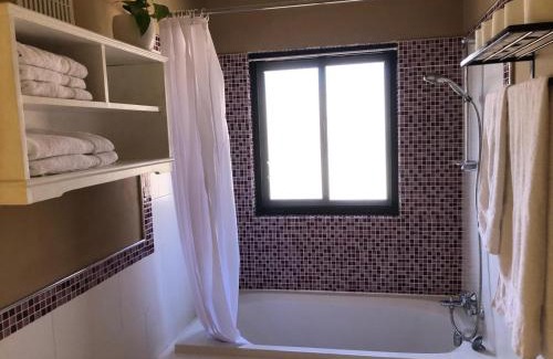 Balzan Apartment | Adinkra Suits