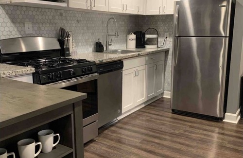 Peachtree Center Condo | Admire the penthouse view of Atlanta’s skyline in this city chic condo in Midtwn