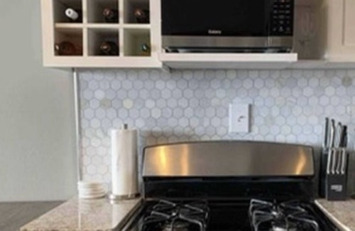 Peachtree Center Condo | Admire the penthouse view of Atlanta’s skyline in this city chic condo in Midtwn