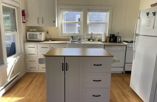 Rockport Cottage | Adorable Beach house with lots of outdoor space and steps to Long Beach!