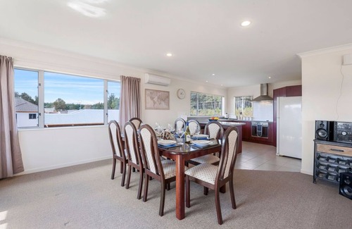 Motuoapa House | Adventure Sika - Relax on the deck with views