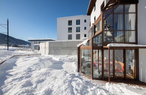 Davos Apartment | Agrimonia - 5,5-Zi Duplex Wohnung bis 11 Personen mit eigenem Garten