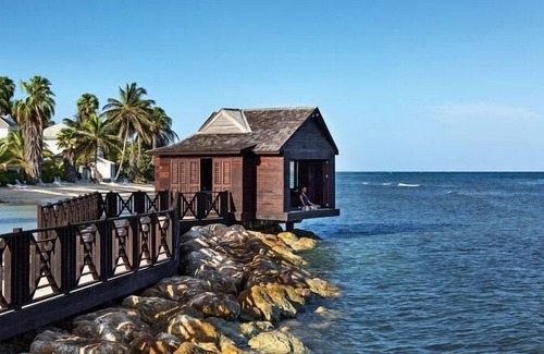Montego Bay Resort | Airy 2 bedroom suites,sea views,private patio,outdoor dining space