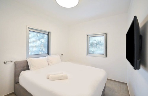 Tel Aviv Apartment | Airy 2BR at Trumpeldor By HolyGuest