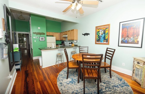 Faubourg Lafayette Apartment | Alligator Alley - Modern, Charming Balcony and Courtyard
