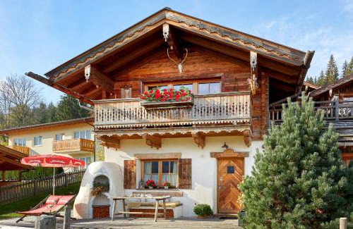 Hundsdorfl Ski Chalet | Almdorf Flachau - Luxus Hüttenurlaub
