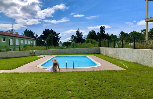 Fisterra Condo | Along Camino De Santiago first line of the beach.