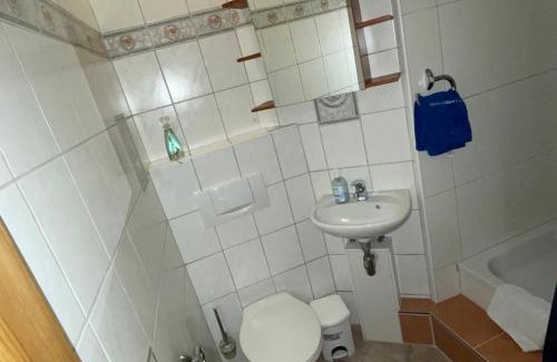 Hemmoor Apartment | Altes Landhaus Oste, Klavier Appartement, 2 Zimmer mit Kamin