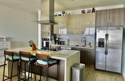 El Tezal Condo | Amazing Luxury Rooftop Condo with Arch Views