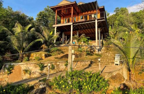 Ham Ninh Ski Chalet | Amazing sunrise over wooden house at the East