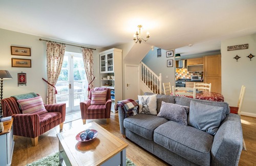Cark Cottage | AMBER COTTAGE, pet friendly, with a garden in Cark In Cartmel