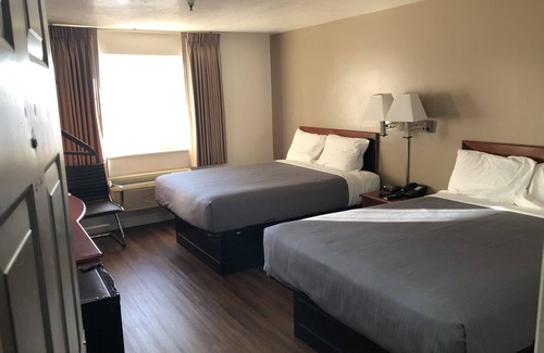 Sunset Hotel | Ameri-Stay Inn & Suites