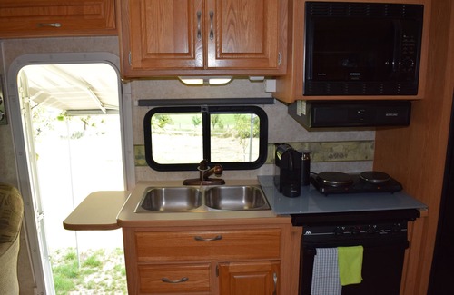 Villars-le-Grand House | American Ford Hurricane motorhome, with slide.