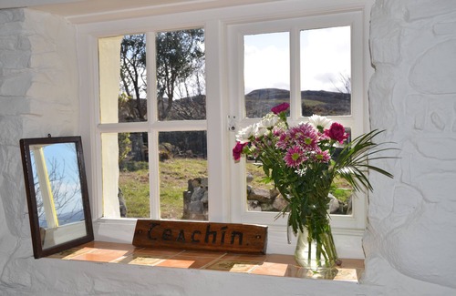 Downings Cottage | An Irish Idyll - traditional stonewall cottage nestled in hills above Downings