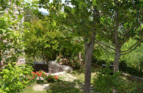 Corciano House | Ancient rock house with garden,situated in the centre,with view of Umbria