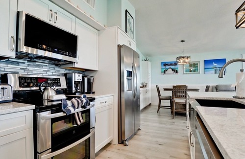 Anna Maria House | Anna Maria Island Rentals - Beach Front - "Angels Envy" -Rod & Reel Pier Retreat
