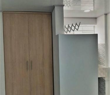 Popayan Apartment | Apartaestudios White And Grey