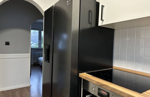 Schloss Holte-Stukenbrock Apartment | Apartment 'Mid - Century' with Shared Terrace, Shared Garden and Wi-Fi