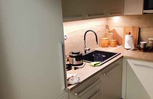 Gozd Martuljek House | Apartma čebela with Julian Alps view in the heart of nature.