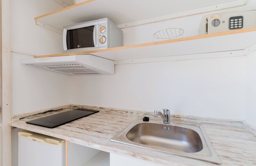 Tuglie Apartment | Apartment 'Angolo Cottura' with Shared Pool, Wi-Fi and Air Conditioning