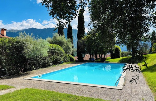 Azzano Apartment | Apartment Bella Vista In Mezzegra lake view pool home by Italian Apartments