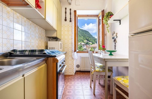 Sella Giudicarie Apartment | Apartment 'Casa Nel Borgo Rose' with Mountain View and Shared Garden