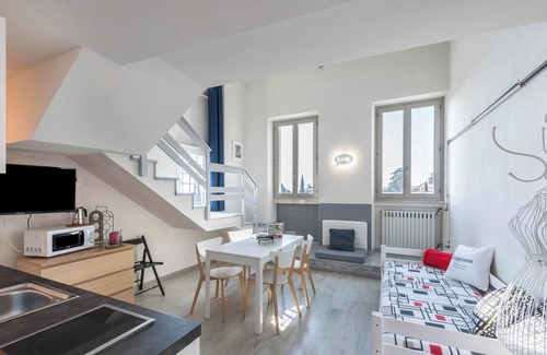 Toscolano Maderno Apartment | Apartment Garda Friends Mondrian with Lake Views, Garden & Wi-Fi