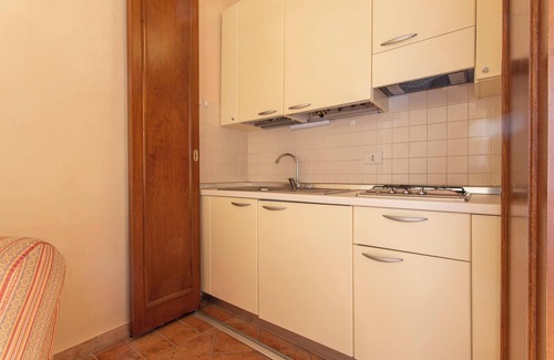 Riotorto Apartment | Apartment Giglio with Sea View, Pool, Wi-Fi, A/C & Garden