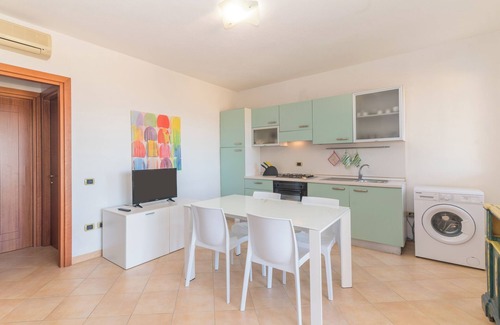 Porto Pozzo Apartment | Apartment “I Mirti di Porto Pozzo” close to the Beach with Sea View, Garden & Terrace