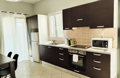 Kalami Apartment | Apartment 'Olympia' with Sea View, Wi-Fi and Air Conditioning