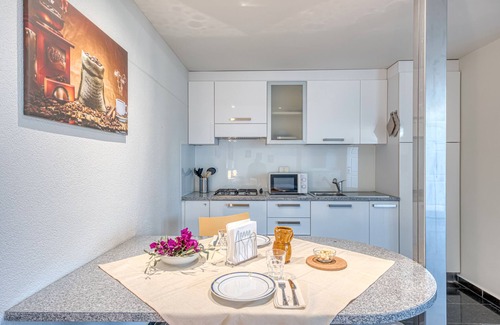 Fontanelle Apartment | Apartment 'Residence Margherita - Bouganwille' with Sea View, Wi-Fi and Air Conditioning