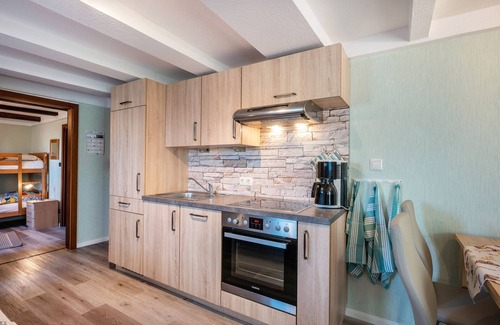 Schulp Apartment | Apartment 'Schimmelreiter' with Private Terrace, Shared Garden and Wi-Fi