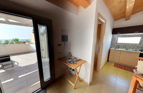 Punta Secca House | Appartamento Odisseo B: A cozy apartment situated at a few steps from a sandy beach, with Free WI-FI.