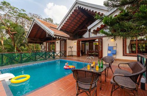 Malavli Villa | Aranyam Villa by StayVista with Modern wooden interiors, Kidszone, Indoor games & plunge pool