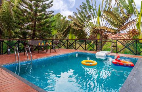 Malavli Villa | Aranyam Villa by StayVista with Modern wooden interiors, Kidszone, Indoor games & plunge pool